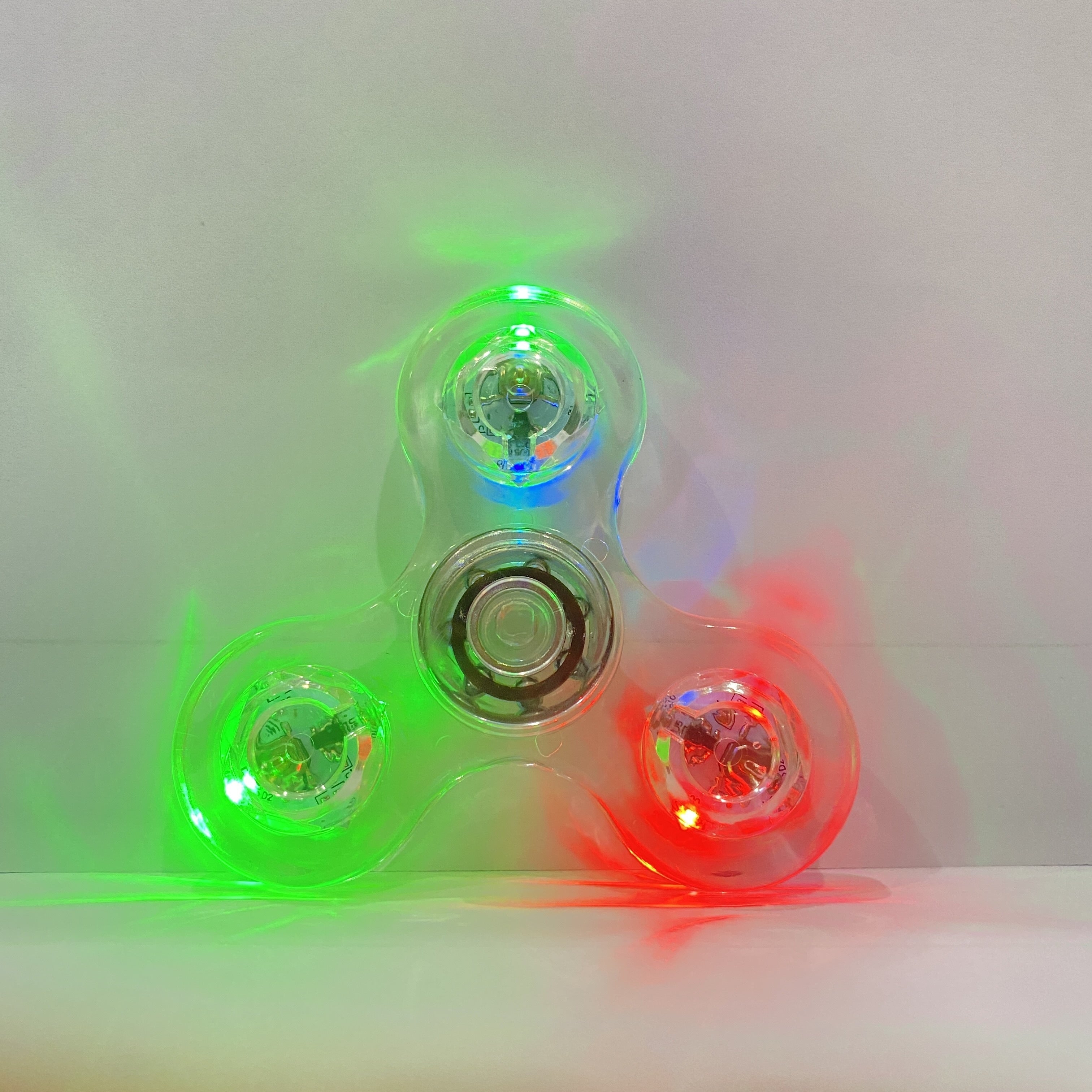 Glow in the Dark Fidget Spinner 12 Pack LED Crystal Spinning Top 4-Gear Adjustable Speed Stress Relief Toy for Kids Teens Adults Party Favor Gift